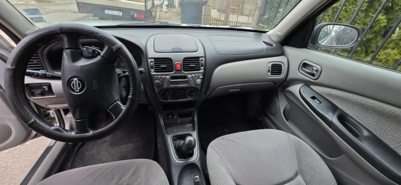 Nissan Almera 1.5 90кс, снимка 4 - Автомобили и джипове - 48061464