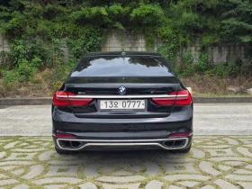 BMW 750 Li xDrive* BOWERS & WILKINS* МАСАЖ* 360* ХЕДЪП* TV, снимка 4