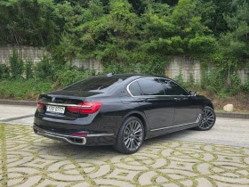 BMW 750 Li xDrive* BOWERS & WILKINS* МАСАЖ* 360* ХЕДЪП* TV, снимка 3