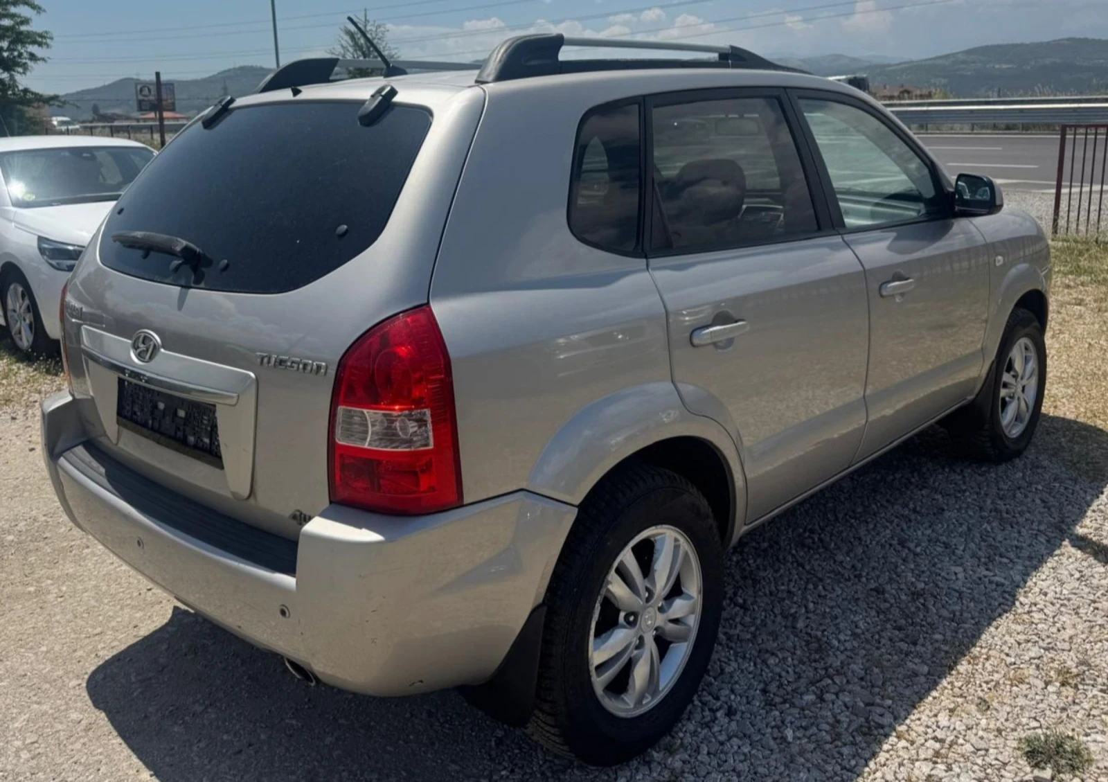 Hyundai Tucson 2.0 газ-бензин 4?4, снимка 5 - Автомобили и джипове - 54704718