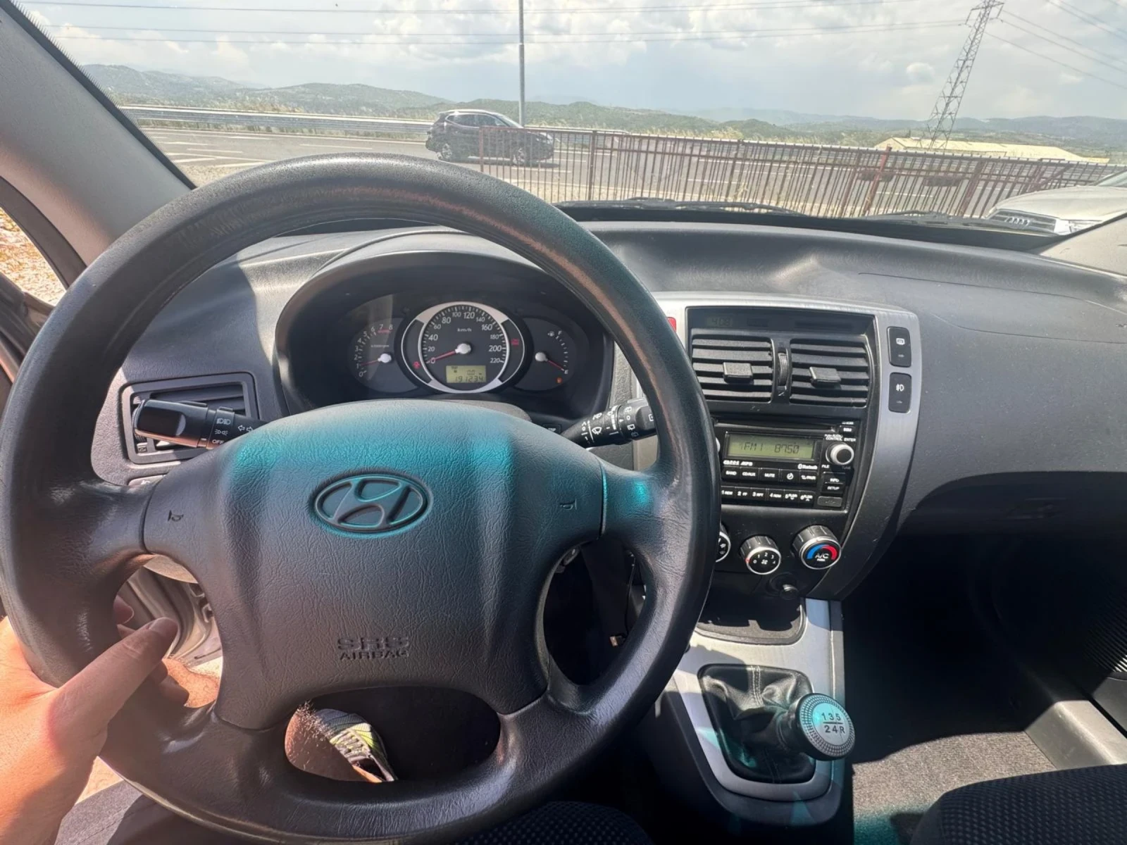 Hyundai Tucson 2.0 газ-бензин 4?4, снимка 11 - Автомобили и джипове - 54704718