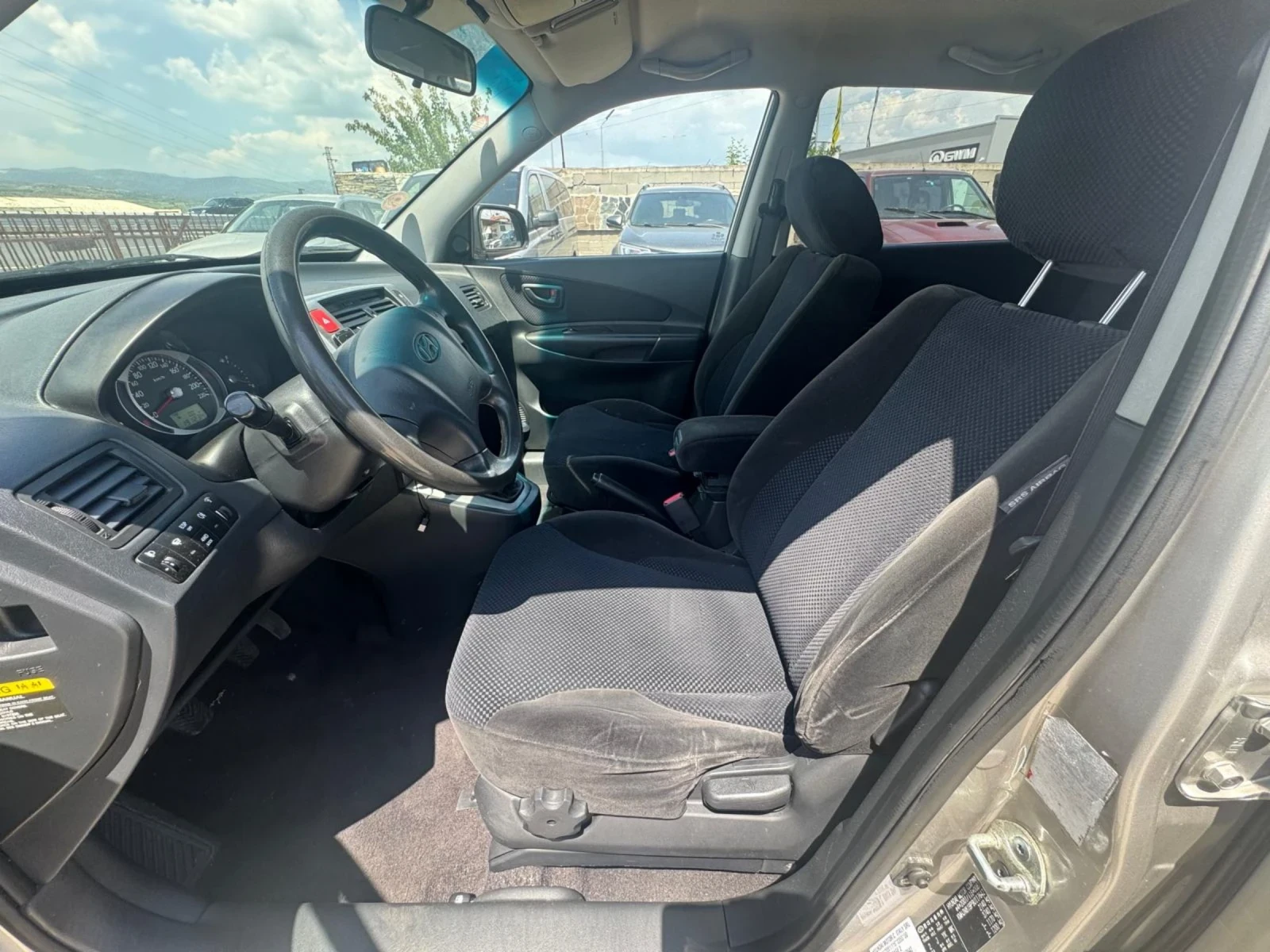 Hyundai Tucson 2.0 газ-бензин 4?4, снимка 9 - Автомобили и джипове - 54704718