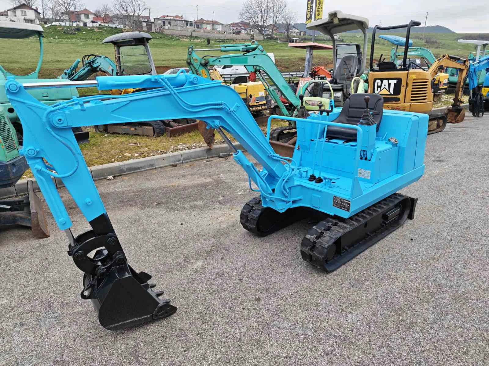 Багер Mitsubishi 1, 5 тон  Джойстици