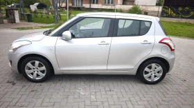 Suzuki Swift 1, 2i КЛИМАТИК 127х км ОТЛИЧЕН ШВЕЙЦАРИЯ , снимка 8