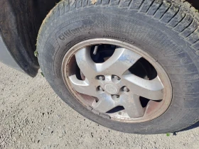 Mazda Tribute 2.0 benzin, снимка 5