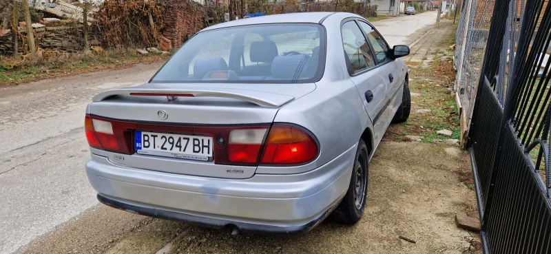 Mazda 323, снимка 4 - Автомобили и джипове - 48068755