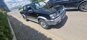 Nissan Navara 2.5 TDI  103к.с, снимка 10