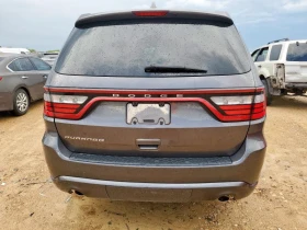 Обява за продажба на Dodge Durango 3.6* V6* 8ZF* ПОДГРЕВ* КАМЕРА* КЕЙЛЕС* LANE* ASSIS ~18 500 лв. - изображение 5 | Auto.bg Обява за продажба на Dodge Durango 3.6* V6* 8ZF* ПОДГРЕВ* КАМЕРА* КЕЙЛЕС* LANE* ASSIS ~18 500 лв. - изображение 5