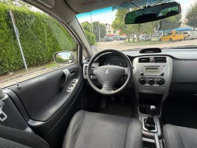 Suzuki Liana Бензин+ Газ- 4Х4, снимка 11