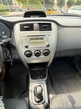 Suzuki Liana Бензин+ Газ- 4Х4, снимка 15