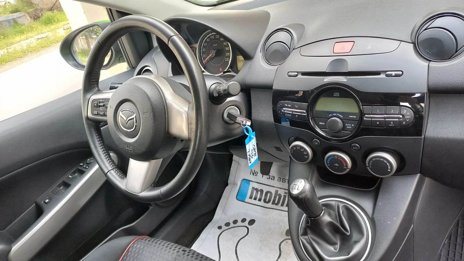 Mazda 2 1.3i 85кс, снимка 14 - Автомобили и джипове - 54217323