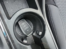 Hyundai Tucson 2.4L 4cyl AWD, снимка 8 - Автомобили и джипове - 53657655