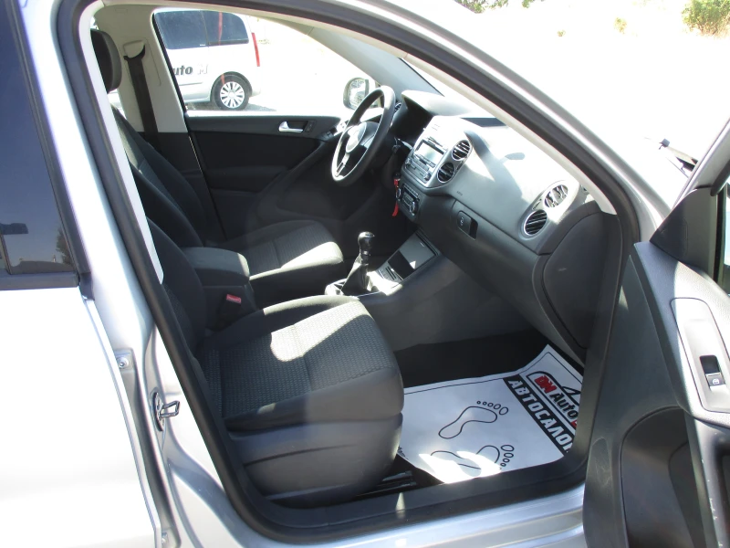 VW Tiguan 2.0TDI/140кс./КАТО НОВА, снимка 13 - Автомобили и джипове - 50808846