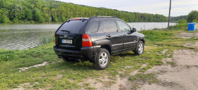 Kia Sportage 2.0 CRDi 4WD 4x4, снимка 13 - Автомобили и джипове - 45373883
