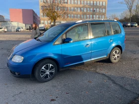 VW Touran - 6000 лв. / 3067.75 € - 29865457 6