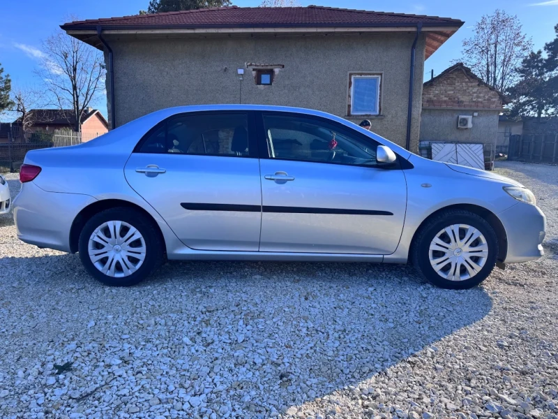 Toyota Corolla 1.6i Климатроник, снимка 6 - Автомобили и джипове - 52851570