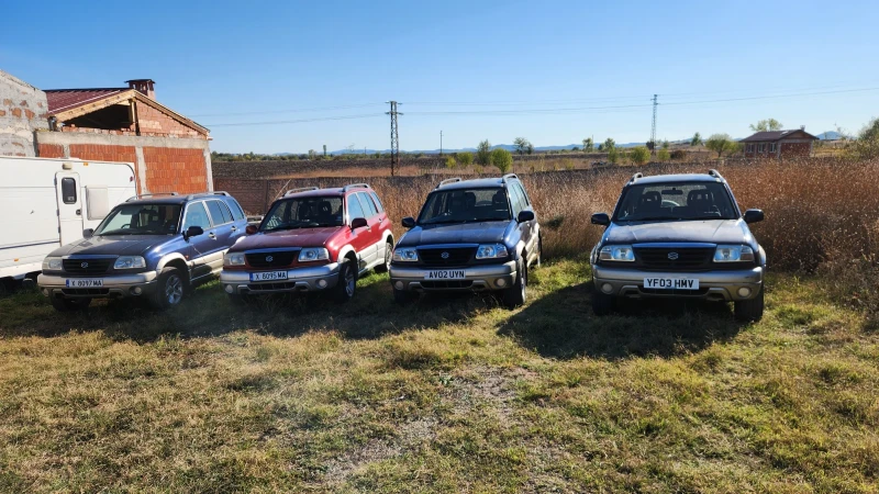 Suzuki Grand vitara 2.0, снимка 14 - Автомобили и джипове - 48313558