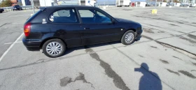 Toyota Corolla G6 (E110), снимка 4