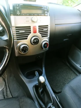Daihatsu Terios 1.5 i 16V 4WD (105 Hp), снимка 9