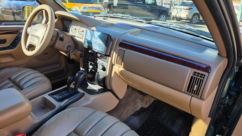 Jeep Grand cherokee 4.7 газов инж., снимка 13 - Автомобили и джипове - 52198741