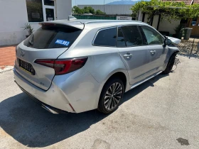 Toyota Corolla 1.8-Хибрид-23г