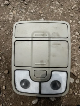 Kia Carens 2015г централен плафон за очила между сенниците , снимка 1