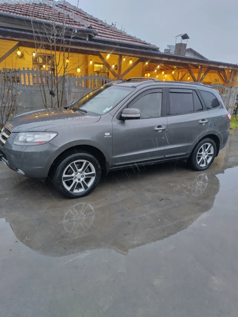 Hyundai Santa fe 2.2НАВИ4х4АВТОМАТ7места, снимка 2 - Автомобили и джипове - 48156937