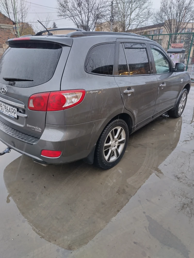 Hyundai Santa fe 2.2НАВИ4х4АВТОМАТ7места, снимка 14 - Автомобили и джипове - 48156937