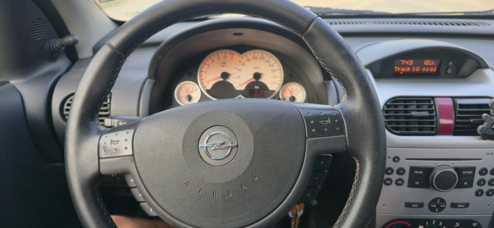 Opel Corsa 1.2 Twinport, снимка 12 - Автомобили и джипове - 55872947