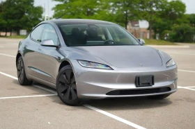 ������ Tesla Model 3