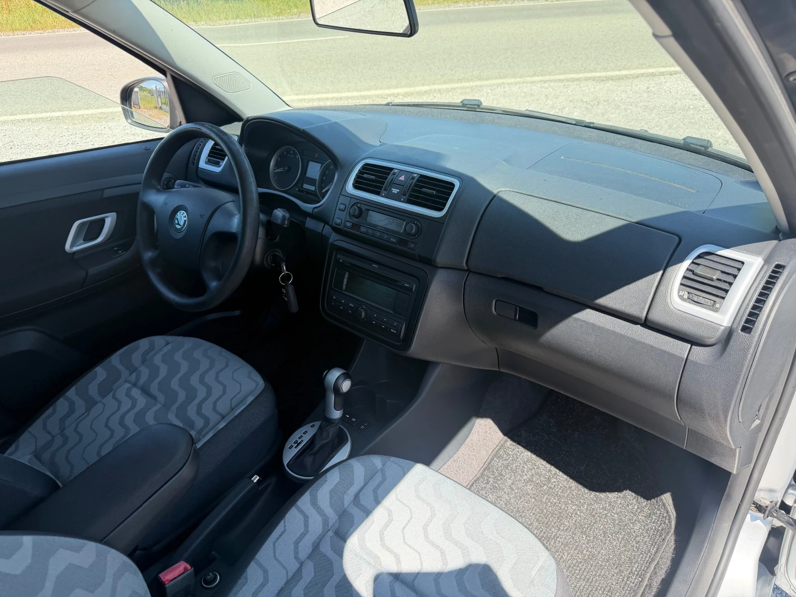 Skoda Roomster 1.6i AUTOMATIC, снимка 12 - Автомобили и джипове - 54913183