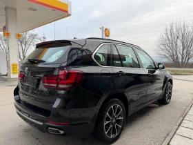 BMW X5 4.0XD-313к.с.-PANORAMA-SPORT-360CAM-KEYLESS GO - 18500 € / 36182.85 лв. - 31927495 6