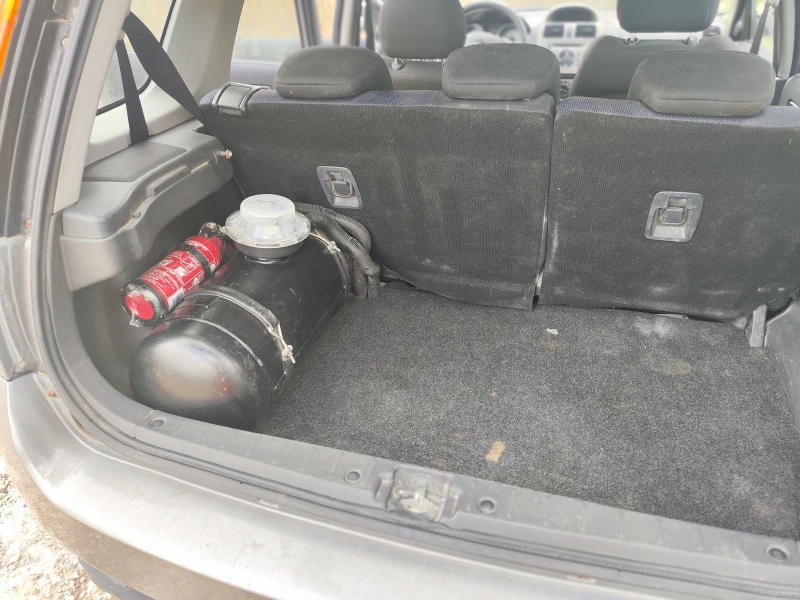 Suzuki Ignis газ/бензин 4x4, снимка 15 - Автомобили и джипове - 51920028