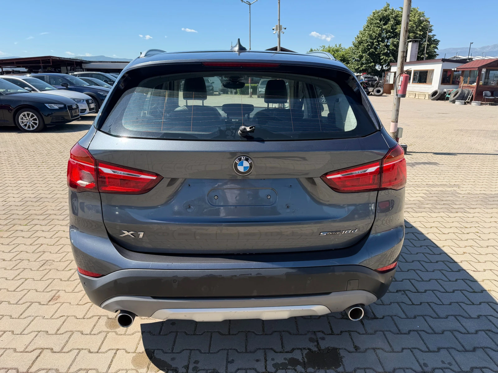 BMW X1 1.8sDrive AVTOMAT/NAVI/KOJA, снимка 7 - Автомобили и джипове - 54913561