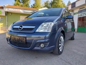     Opel Meriva 1.4- 90. .