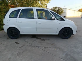 Opel Meriva 1.7 cdti 101к 2009 г панорама - 3750 лв. / 1917.34 € - 48691352 6