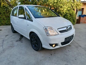 Opel Meriva 1.7 cdti 101к 2009 г панорама - 3750 лв. / 1917.34 € - 48691352 7