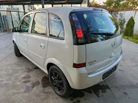 Opel Meriva 1.7 cdti 101к 2009 г панорама - 3750 лв. / 1917.34 € - 48691352 5