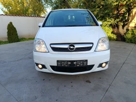 Opel Meriva 1.7 cdti 101к 2009 г панорама - 3750 лв. / 1917.34 € - 48691352 8