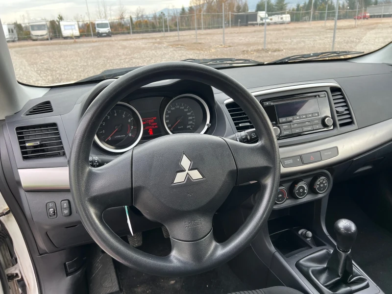 Mitsubishi Lancer 1.6 i Schweiz, снимка 11 - Автомобили и джипове - 53153202