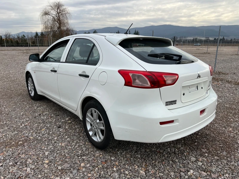 Mitsubishi Lancer 1.6 i Schweiz, снимка 8 - Автомобили и джипове - 53153202