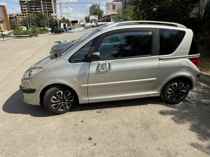 Peugeot 1007 1.6 i 16V (110 Hp)