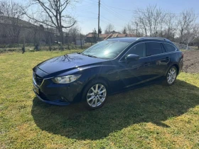 ������ Mazda 6