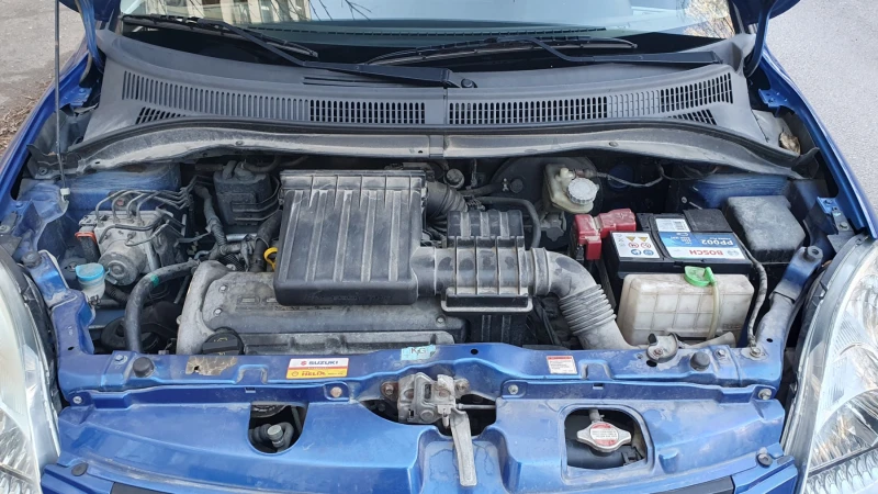 Suzuki Swift 1.3i Автоматик 4вр., снимка 14 - Автомобили и джипове - 53121426