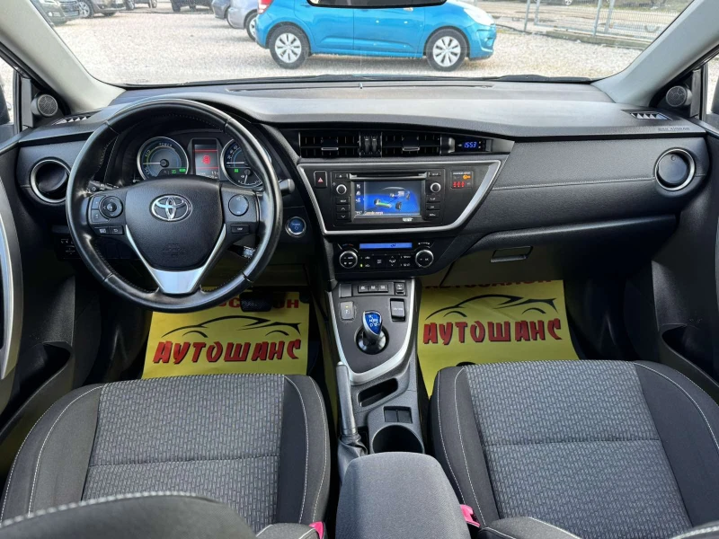 Toyota Auris 1.8HYBRID, снимка 9 - Автомобили и джипове - 53403846