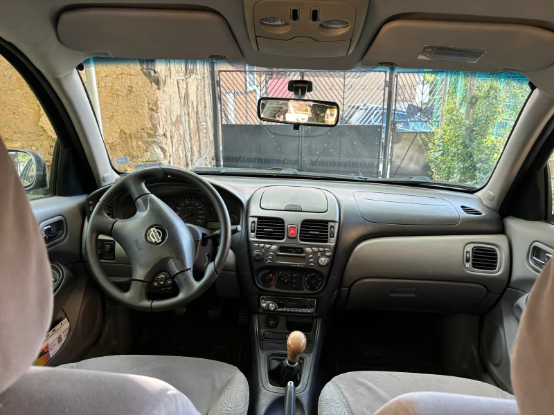 Nissan Almera, снимка 5 - Автомобили и джипове - 47338946