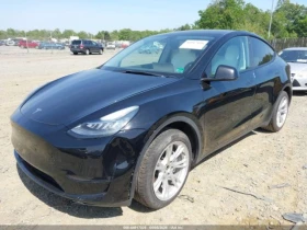 Tesla Model Y * LONG RANGE* DUAL MOTOR* КОЖА* ПОДГРЕВ* ПАНОРАМА*, снимка 2