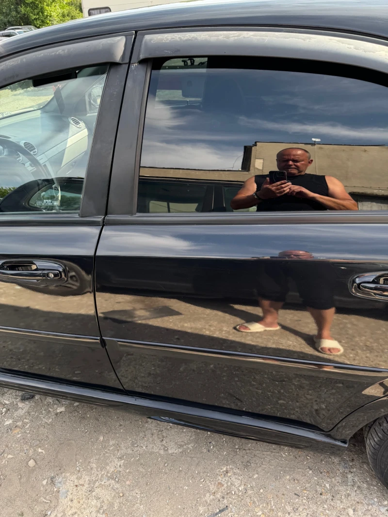 Chevrolet Lacetti 1.8i, снимка 11 - Автомобили и джипове - 50707378