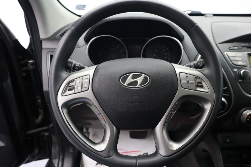 Hyundai Tucson 2.4, снимка 14 - Автомобили и джипове - 49491787