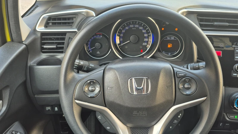 Honda Jazz 1.3 i-VTEC ОТЛИЧНА, снимка 14 - Автомобили и джипове - 46663394